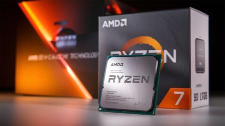Procesador AMD Ryzen 7 9800X3D con tecnología 3D V-Cache sobre su caja de embalaje con diseño en negro y naranja