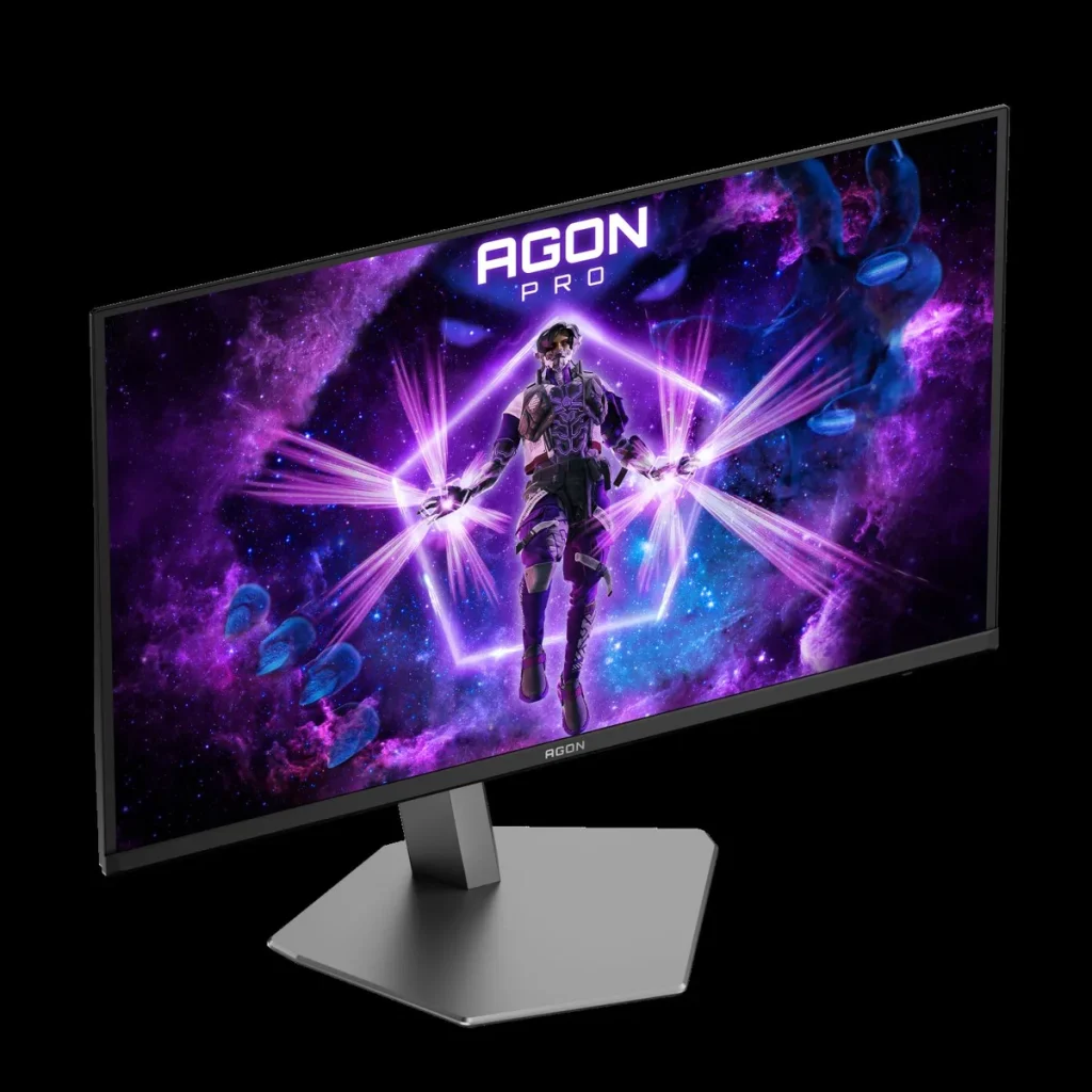 An AGON PRO gaming monitor displays a vibrant image of a futuristic warrior with glowing energy beams amidst a cosmic background.