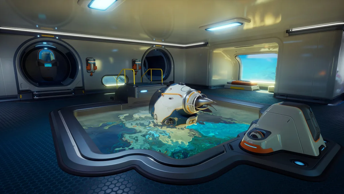 A futuristic underwater base interior from the game'Subnautica 2' featuring a docking bay with a small submarine partially submerged in a pool.