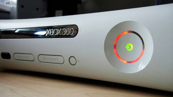 A close-up of an Xbox 360 console showing the infamous'Red Ring of Death' light.