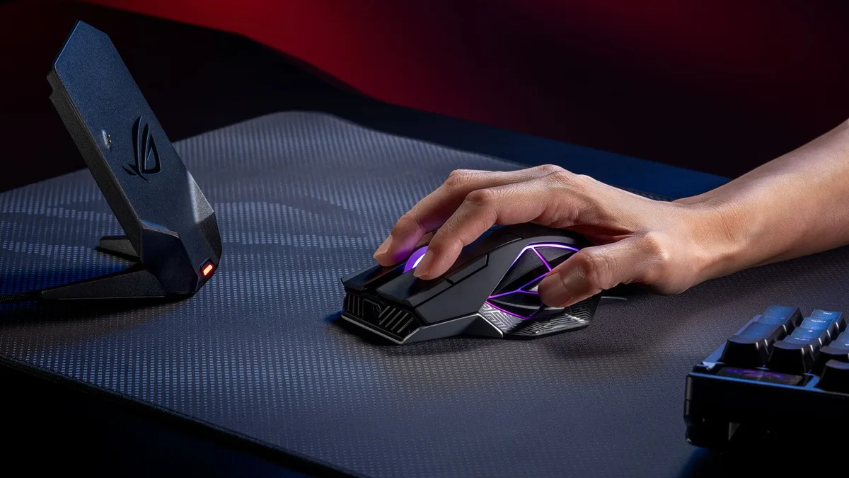The ROG Spatha X 65K on a gray ROG deskmat.