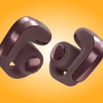 The Bose Ultra Open Earbuds 2nd Gen in their Cherry Chocolate finish.