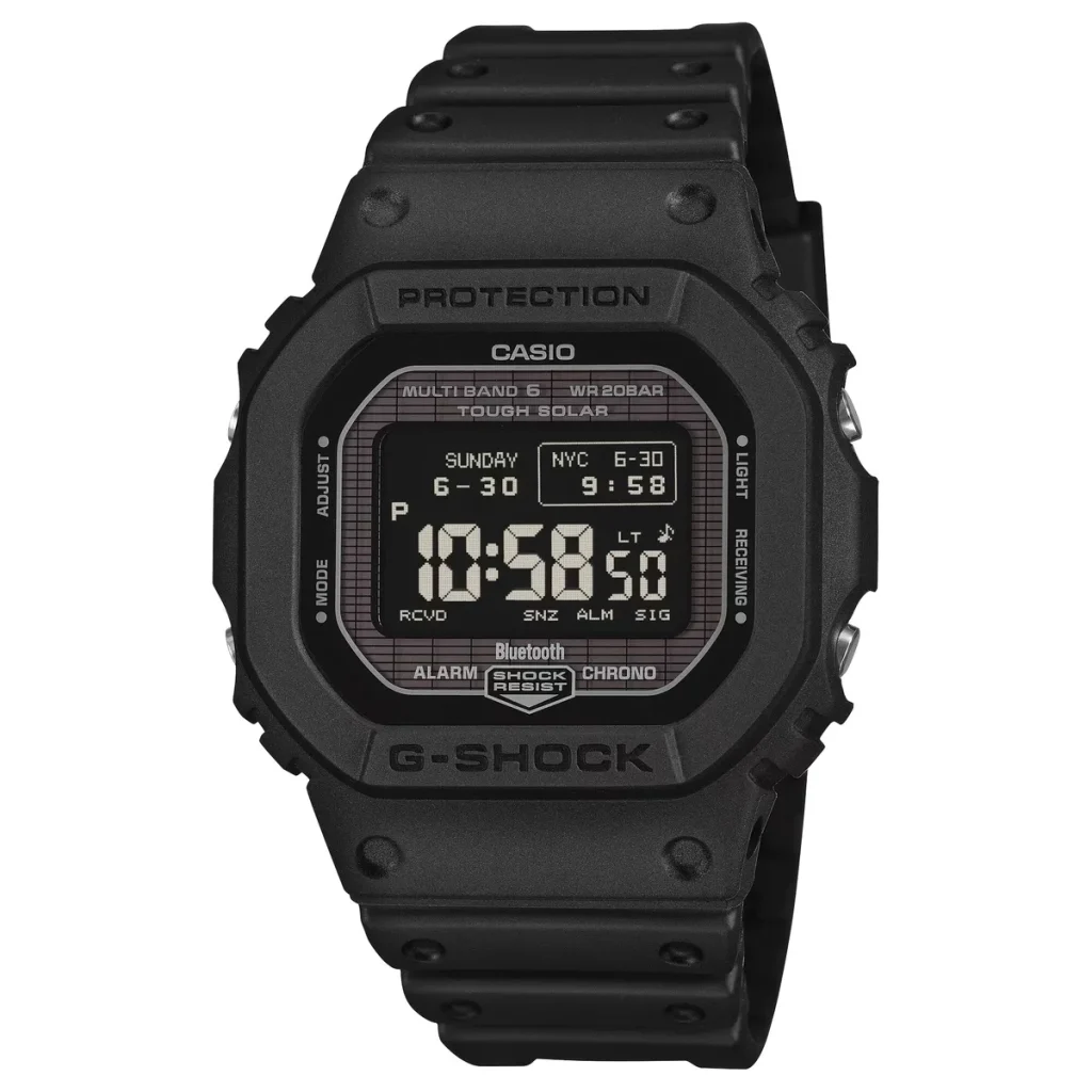 GW-BX5600 precio especificaciones — Casio G-Shock GW-BX5600-1 digital watch with a black resin case and band, featuring a positive MIP display with light characters on a dark-colored background.