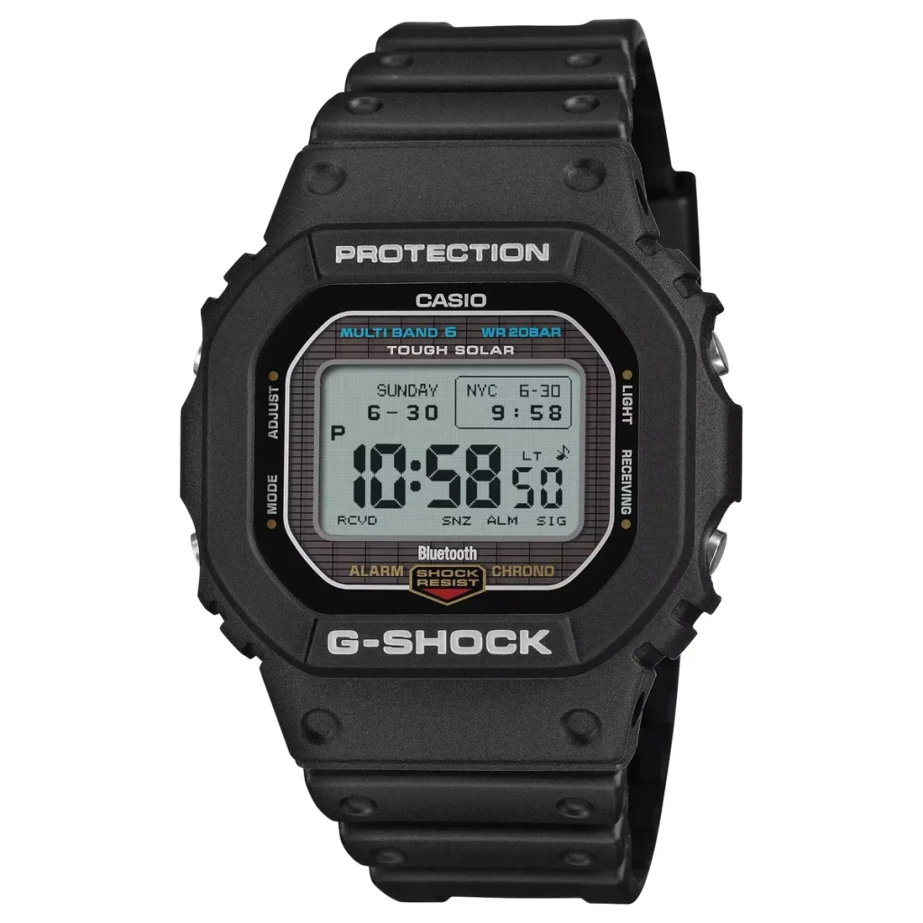 Casio G-Shock GW-BX5600-1A1 digital watch with a black resin case and band, featuring a high-contrast negative MIP display.