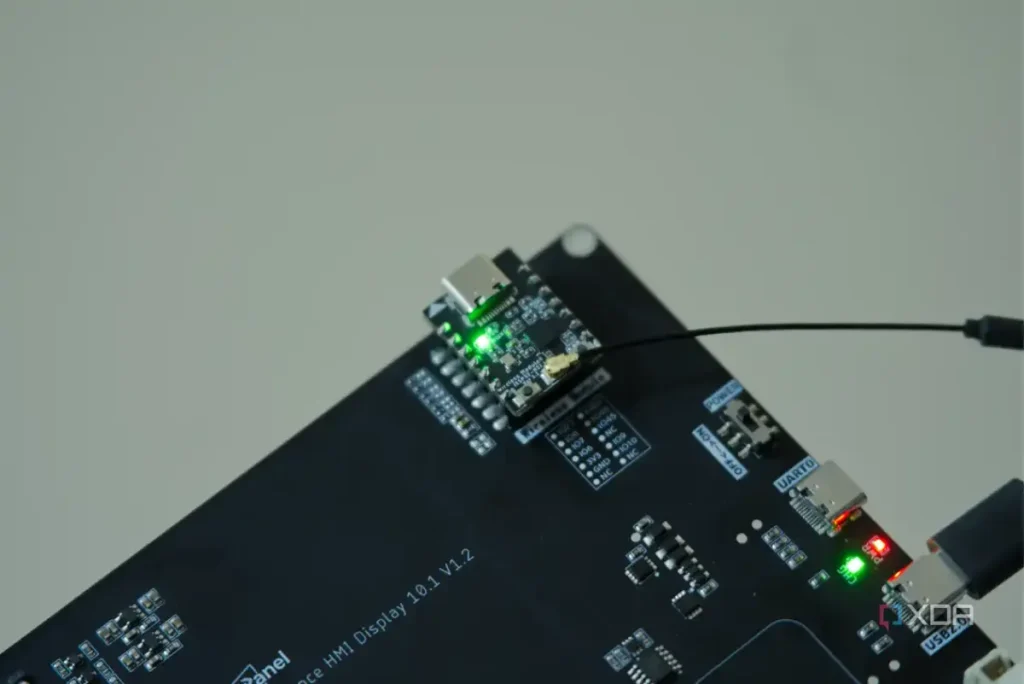 ESP32-H2 attached to the back of the Elecrow CrowPanel Advance ESP32-P4 10.1 inch display