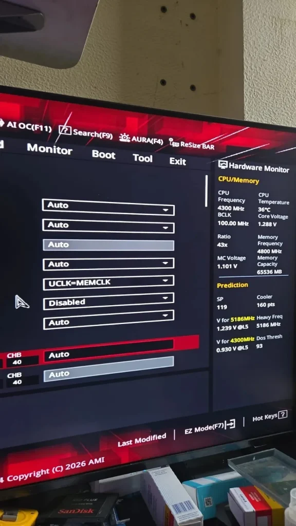 BIOS settings screen on a computer monitor displaying 'Hardware Monitor' with CPU frequency at 4300 MHz and temperature at 36°C.