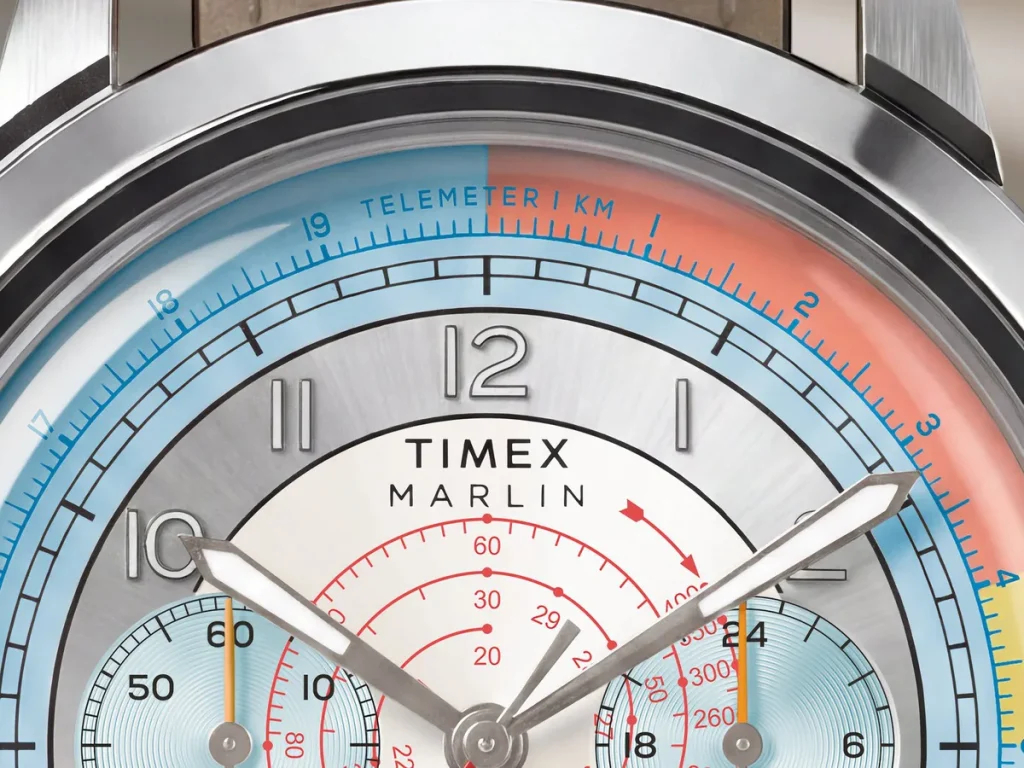 Close-up of the Timex Marlin Neo Classic Chronograph dial showing its blue telemeter scale, red tachymeter scale, and two subdials.