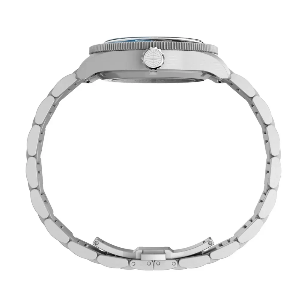 Timex Pan Am Waterbury Automatic GMT watch shown from the side, highlighting its brushed stainless steel case and oversized crown with the Pan Am logo.