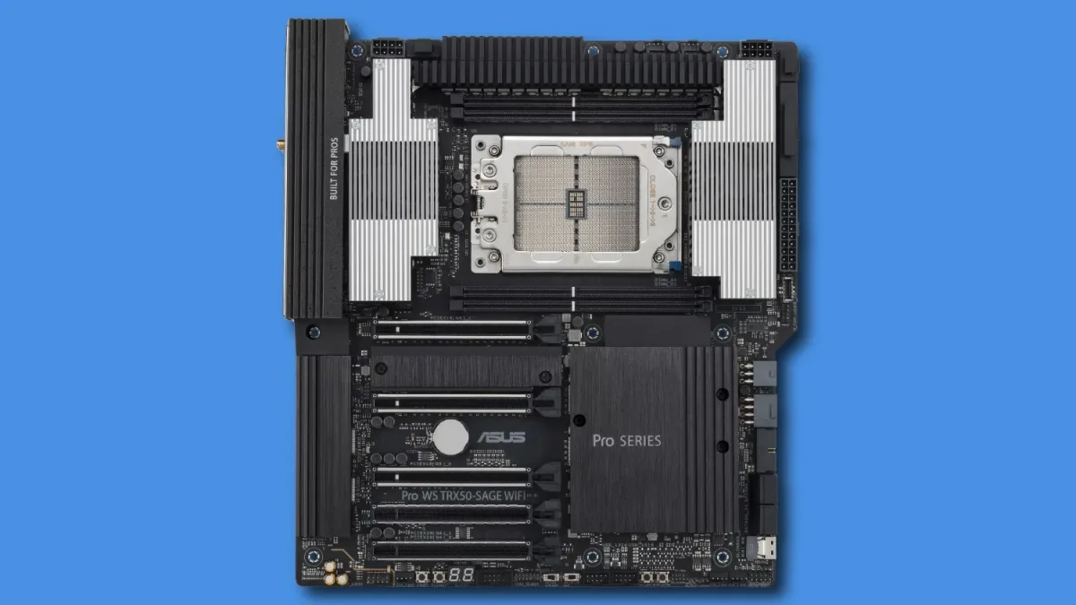 Vista cenital de una placa base ASUS Pro Series con zócalo de CPU, ranuras de RAM y PCIe y grandes disipadores negros