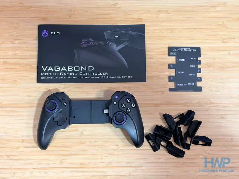 Contenido de la caja del Elo Vagabond: mando, manual, guía de tallas y adaptadores