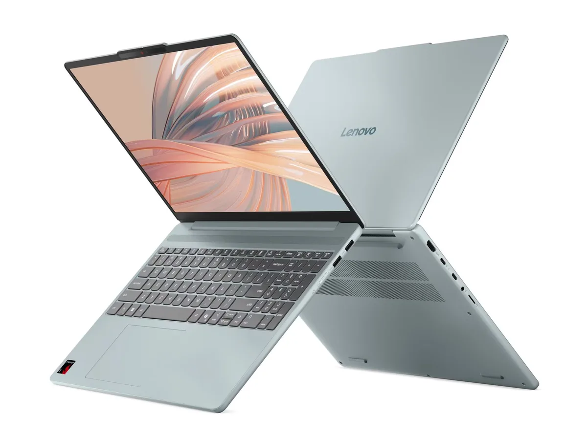Portátil Lenovo IdeaPad Vibe 15Q8X12 abierto, con teclado y pantalla, junto a su tapa trasera